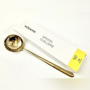NIB Modere gold spoon